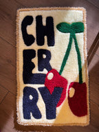Tapis mural capitonné en cerisier avec lettrage CHERRY, 55x33 cm